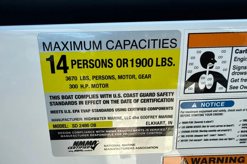 Slide: The Image of 2018 Hurricane SunDeck 2486 OB capacity label, 14 persons or 1900 lbs, 300 HP motor. - 34
