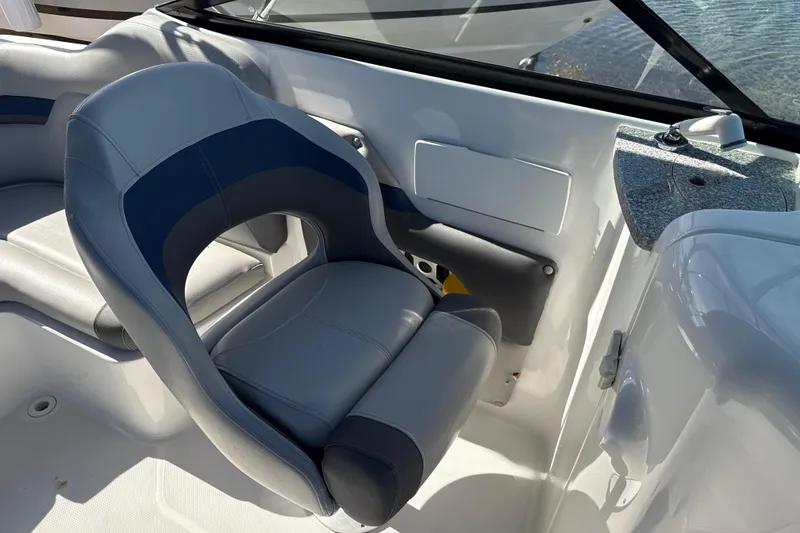 Slide: The Image of 2018 Hurricane SunDeck 2486 OB boat interior with comfortable seating and sleek design. - 35