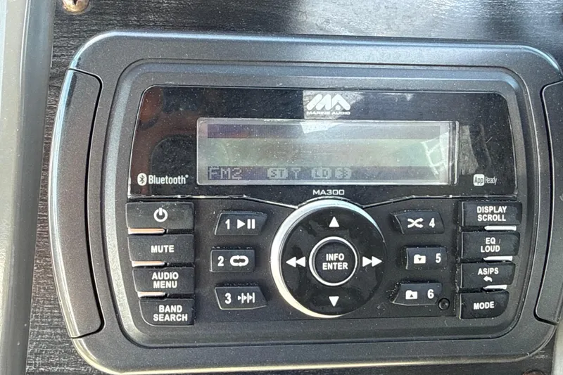 Slide: The Image of Marine audio system on a 2018 Hurricane SunDeck 2486 OB boat dashboard. - 44