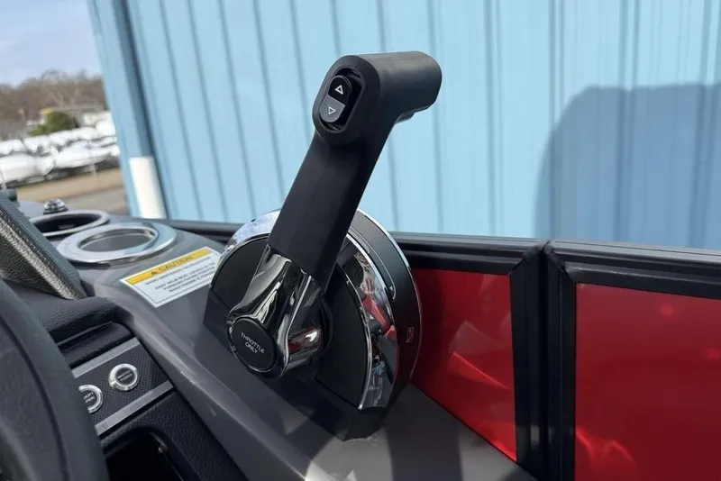 Slide: The Image of Dashboard of 2026 Godfrey Monaco 235 SFL boat with Simrad display and gauges. - 17