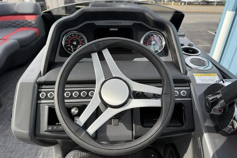 Slide: The Image of Interior of 2026 Godfrey Monaco 235 SFL pontoon boat with luxurious seating and modern design. - 20