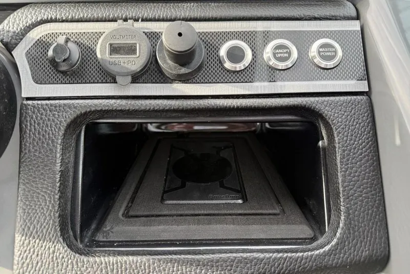 Slide: The Image of Control panel of 2026 Godfrey Monaco 235 SFL with JL Audio system. - 21