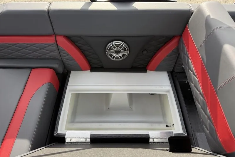 Slide: The Image of 2026 Godfrey Monaco 235 SFL boat interior with open storage compartment and seating. - 24