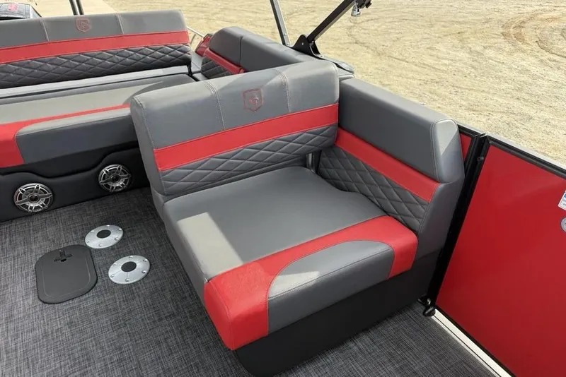 Slide: The Image of 2026 Godfrey Monaco 235 SFL boat interior with red and gray seating. - 28