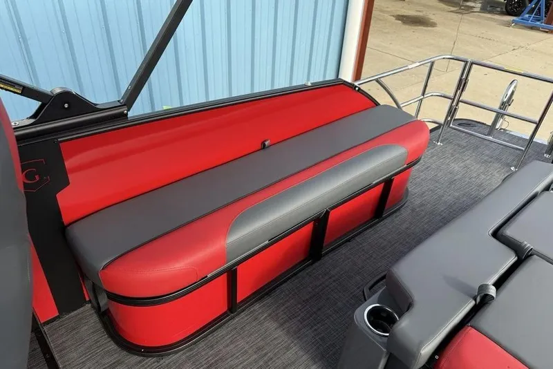 Slide: The Image of 2026 Godfrey Monaco 235 SFL boat interior with stylish red and gray seating. - 30