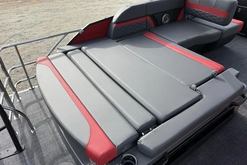 Slide: The Image of 2026 Godfrey Monaco 235 SFL boat with gray and red cushioned seating. - 34