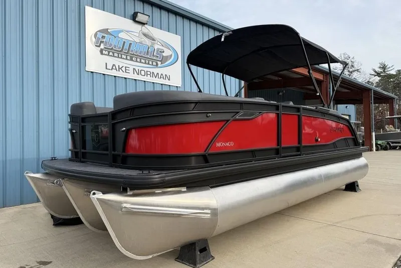 Slide: The Image of 2026 Godfrey Monaco 235 SFL boat interior with red and gray seating and flooring. - 36