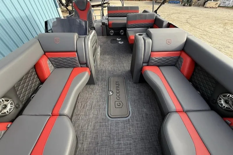 Slide: The Image of Luxurious interior of 2026 Godfrey Monaco 235 SFL pontoon boat with red and gray seating. - 39