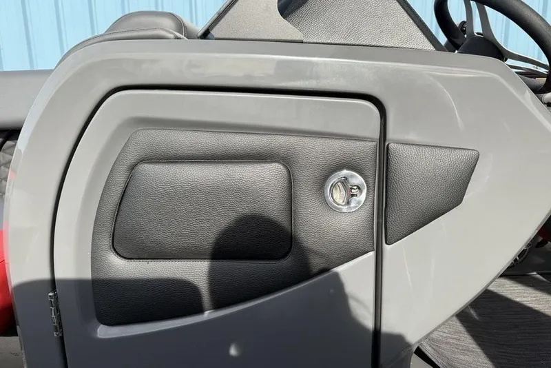 Slide: The Image of 2026 Godfrey Monaco 235 SFL boat interior with open floor storage compartment. - 7