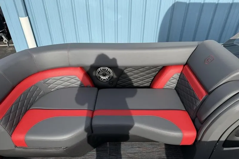 Slide: The Image of Interior of 2026 Godfrey Monaco 235 SFL boat with stylish seating and branded flooring. - 9