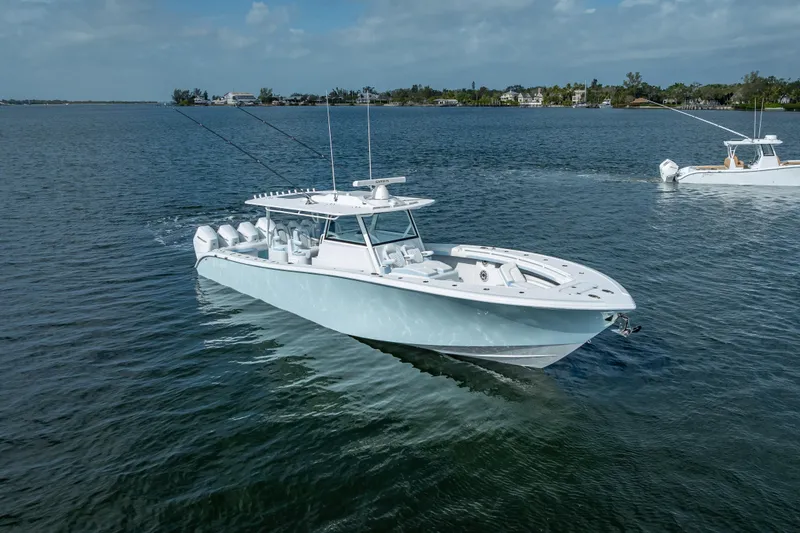 The Image of 2026 Yellowfin 42 Offshore boat cruising on calm waters under a clear sky. - 0