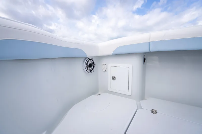 Slide: The Image of 2026 Yellowfin 42 Offshore boat interior with speaker and storage compartment. - 17