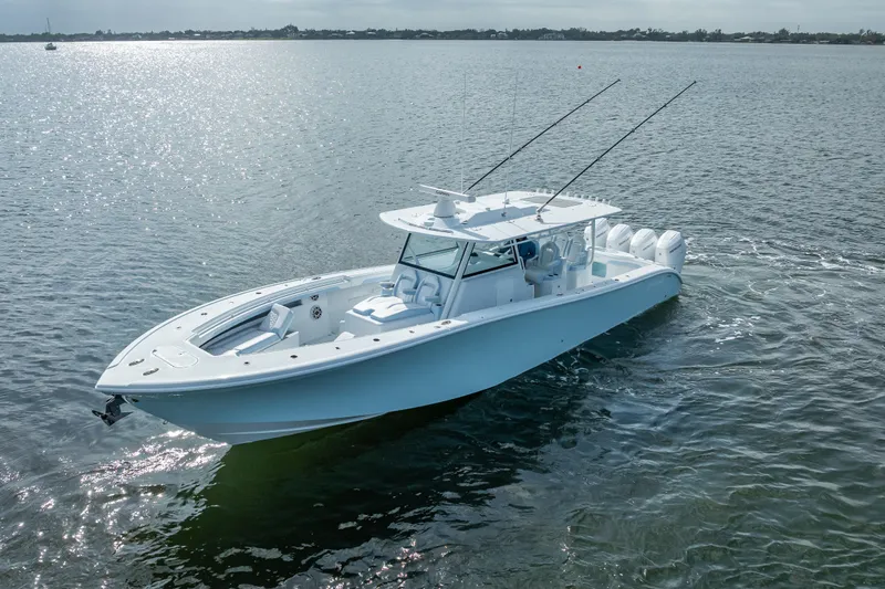 Slide: The Image of 2026 Yellowfin 42 Offshore boat cruising on calm waters. - 2