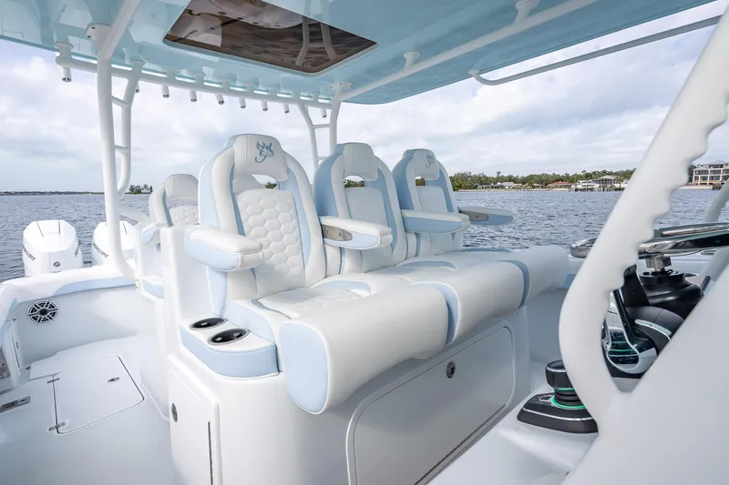 Slide: The Image of 2026 Yellowfin 42 Offshore boat interior with luxurious seating and modern design. - 23