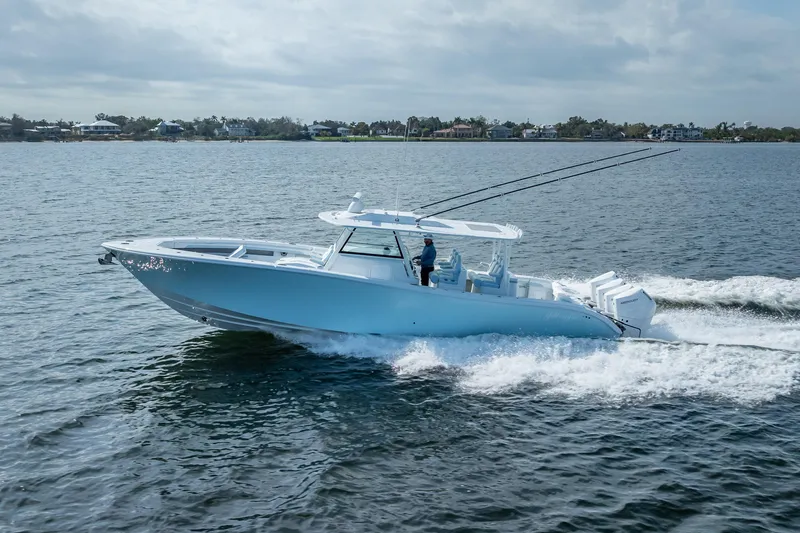 Slide: The Image of 2026 Yellowfin 42 Offshore boat cruising on open water. - 3