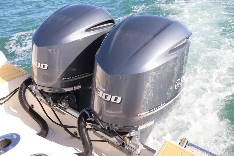 Slide: The Image of Twin Yamaha 300 outboard engines on a 2017 Sailfish 320 CC boat. - 26