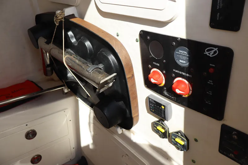 Slide: The Image of Control panel and equipment inside a 2017 Sailfish 320 CC boat. - 30