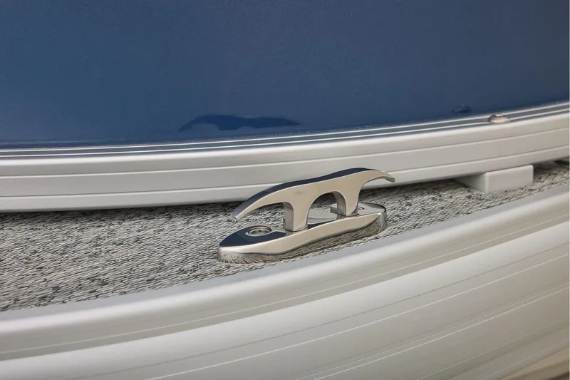 Slide: The Image of Manufacturer Provided Image: 2026 Sun Tracker Bass Buggy 18 DLX boat cleat on textured deck surface. - 17