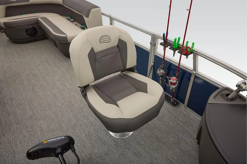 Slide: The Image of Manufacturer Provided Image: 2026 Sun Tracker Bass Buggy 18 DLX interior with fishing rods and seating. - 25