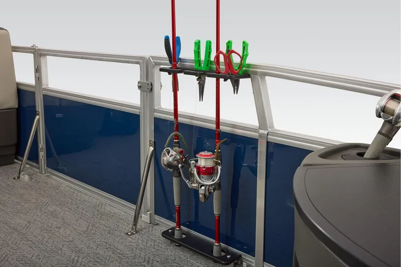 Slide: The Image of Manufacturer Provided Image: 2026 Sun Tracker Bass Buggy 18 DLX fishing rod holder with tools on deck. - 29