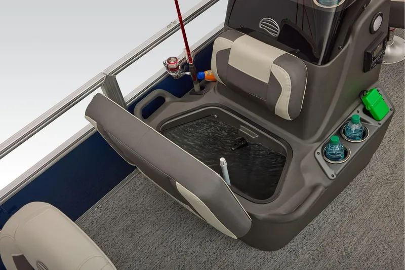 Slide: The Image of Manufacturer Provided Image: 2026 Sun Tracker Bass Buggy 18 DLX interior with storage, cup holders, and fishing rod setup. - 31