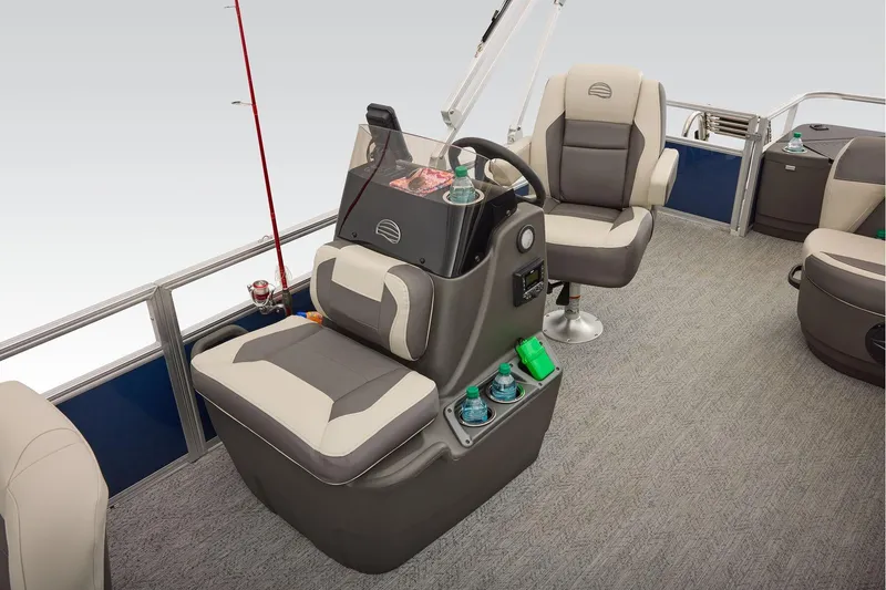 Slide: The Image of Manufacturer Provided Image: 2026 Sun Tracker Bass Buggy 18 DLX interior with steering console and seating. - 32