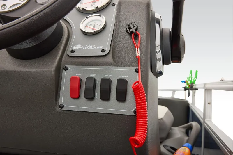 Slide: The Image of Manufacturer Provided Image: 2026 Sun Tracker Bass Buggy 18 DLX dashboard with controls and safety features. - 40