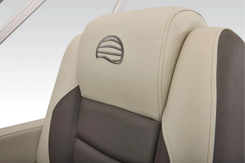 Slide: The Image of Manufacturer Provided Image: 2026 Sun Tracker Bass Buggy 18 DLX seat with beige and gray upholstery. - 42