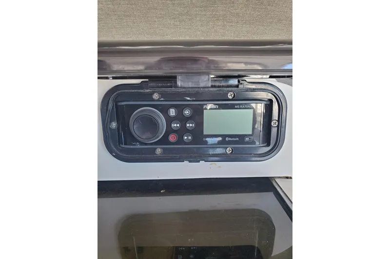 Slide: The Image of Control panel of a 2003 Hunter 426 Deck Salon with Bluetooth and audio features. - 30