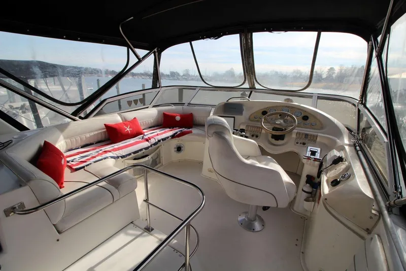 Slide: The Image of 1997 Cruisers Yachts 3650 Motoryacht interior with helm, seating, and nautical decor. - 16