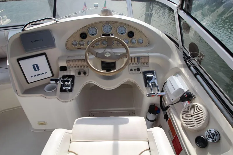 Slide: The Image of 1997 Cruisers Yachts 3650 Motoryacht helm with Garmin and Furuno navigation systems. - 17