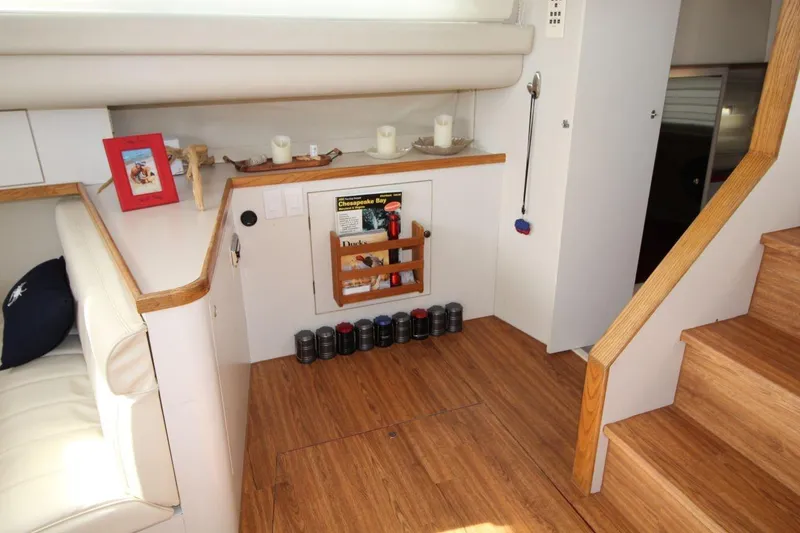 Slide: The Image of 1997 Cruisers Yachts 3650 Motoryacht interior with wooden flooring and cozy decor. - 22