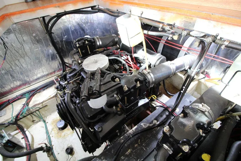Slide: The Image of Engine room of 1997 Cruisers Yachts 3650 Motoryacht with visible components and wiring. - 35
