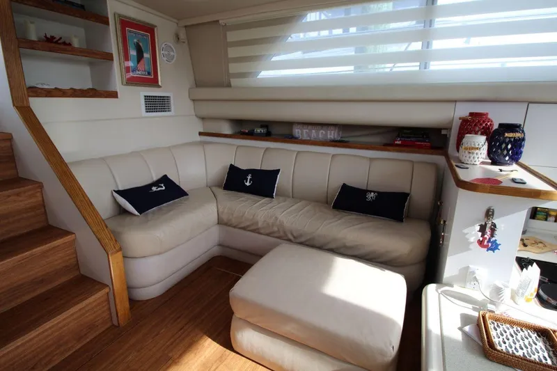 Slide: The Image of Luxurious interior of 1997 Cruisers Yachts 3650 Motoryacht with cozy seating and nautical decor. - 21