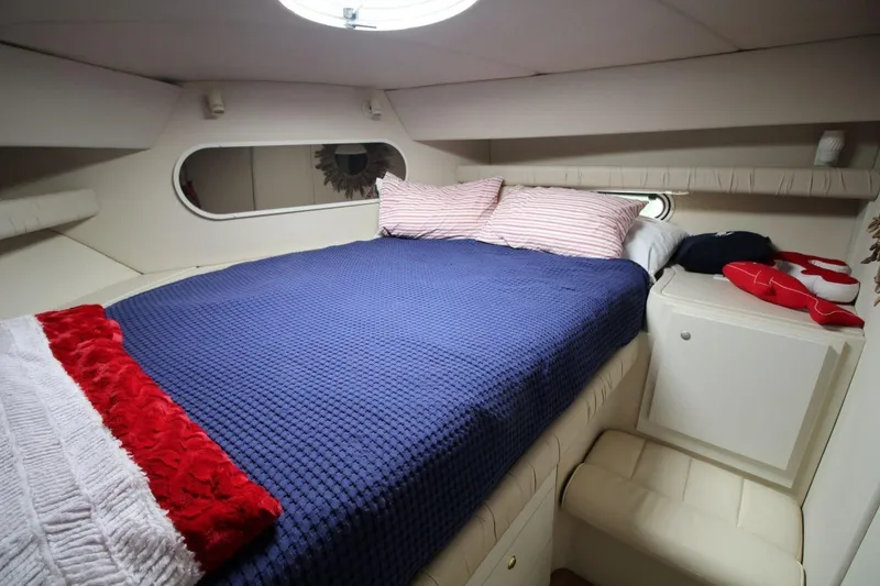 Slide: The Image of Luxurious cabin interior of 1997 Cruisers Yachts 3650 Motoryacht with cozy bedding. - 29