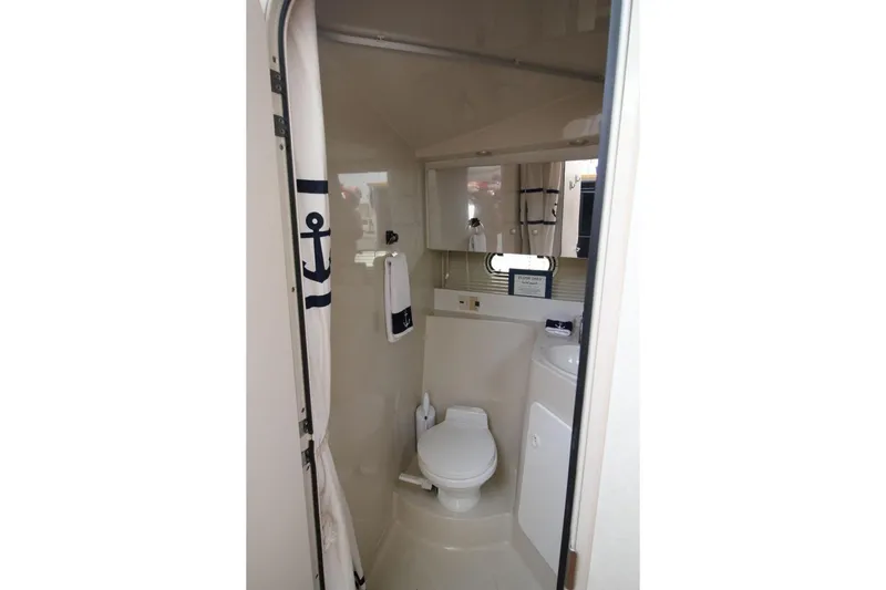 Slide: The Image of Bathroom interior of 1997 Cruisers Yachts 3650 Motoryacht with nautical decor. - 32
