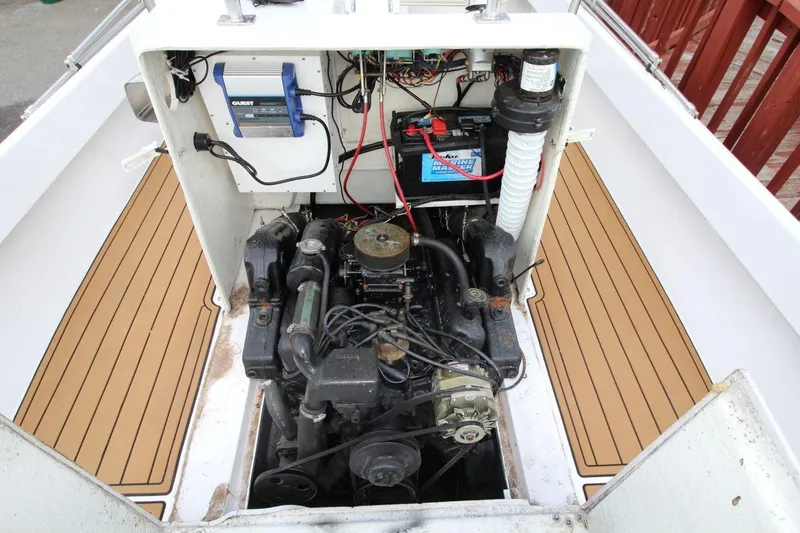 Slide: The Image of 1979 Shamrock 200 Stalker engine compartment with visible wiring and components. - 9