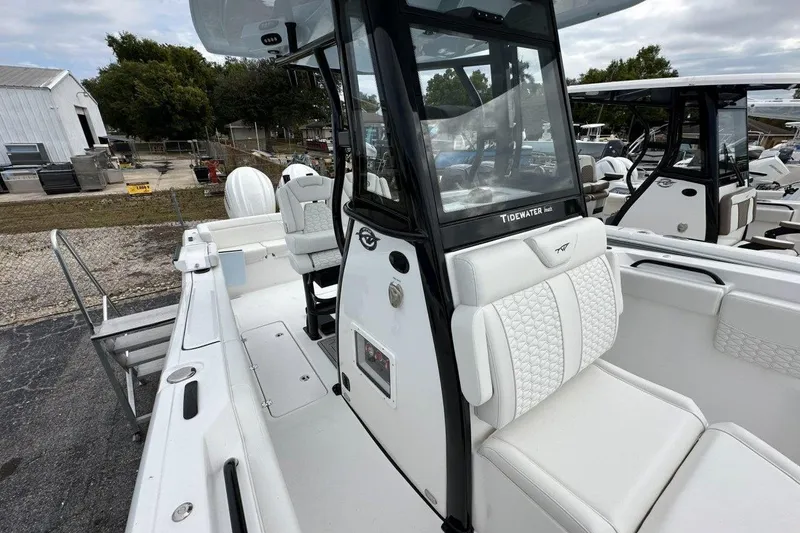 Slide: The Image of 2026 Tidewater 272 LXF boat with sleek white interior and modern design. - 12