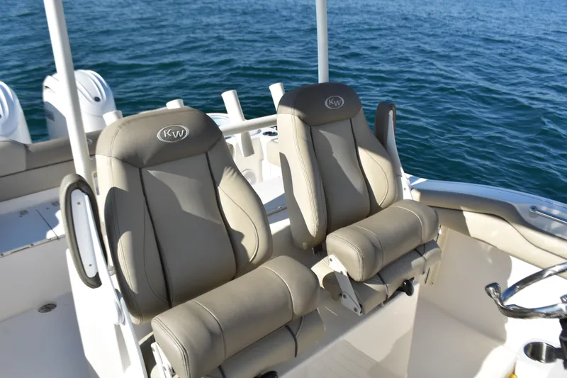Slide: The Image of 2024 Key West 263 FS boat seats with ocean backdrop. - 18
