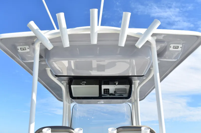 Slide: The Image of 2024 Key West 263 FS boat top view with rod holders and electronics. - 20