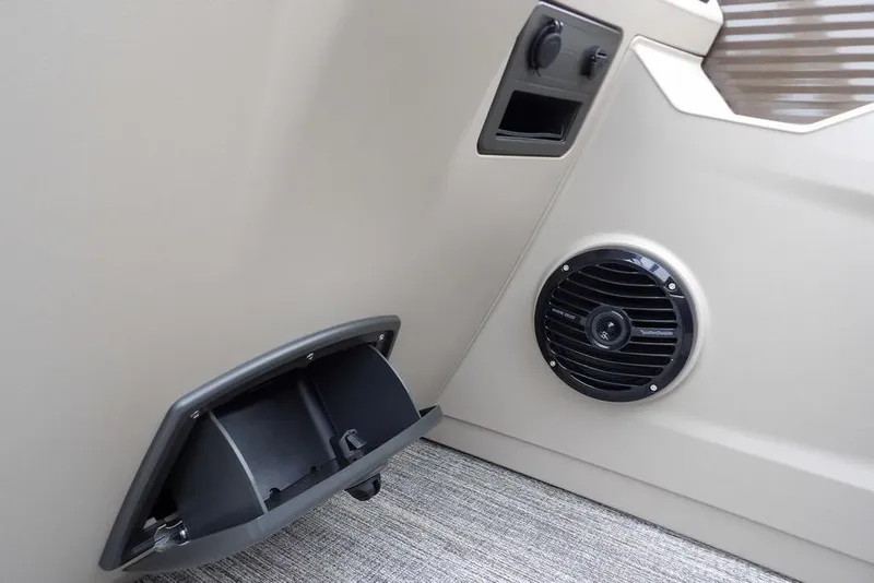 Slide: The Image of Interior of 2026 Bennington S Swingback 21 SSB with speaker and storage compartment. - 15