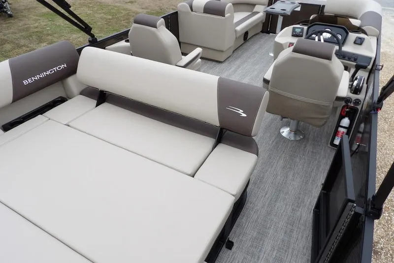 Slide: The Image of 2026 Bennington S Swingback 21 SSB pontoon boat interior with plush seating and modern design. - 24