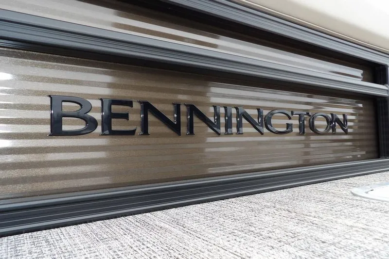 Slide: The Image of Bennington logo on 2026 S Swingback 21 SSB boat, sleek metallic finish. - 30