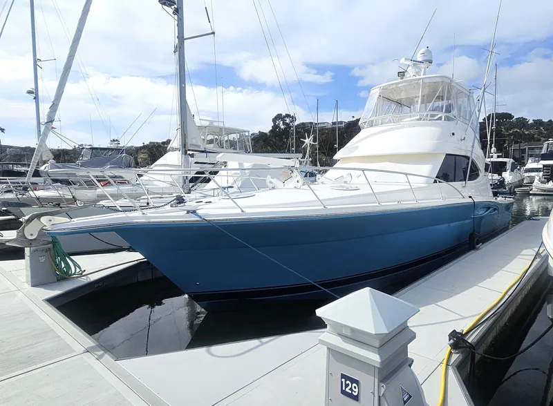 The Image of 2005 Riviera 42 Flybridge yacht docked at marina. - 0