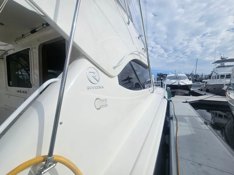 Slide: The Image of Riviera 42 Flybridge 2005 at dock, side view. - 10