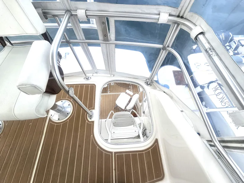 Slide: The Image of Interior view of 2005 Riviera 42 Flybridge with wooden flooring. - 17