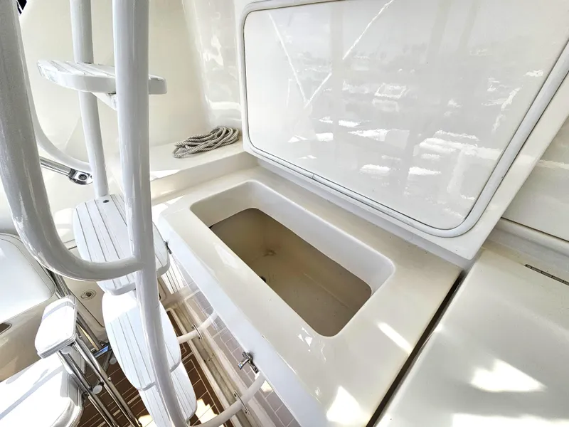 Slide: The Image of Riviera 42 Flybridge 2005 yacht interior with storage compartment. - 20