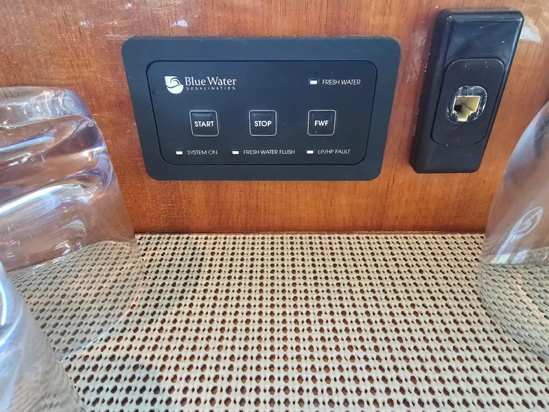 Slide: The Image of Riviera 42 Flybridge 2005 control panel with BlueWater system. - 37