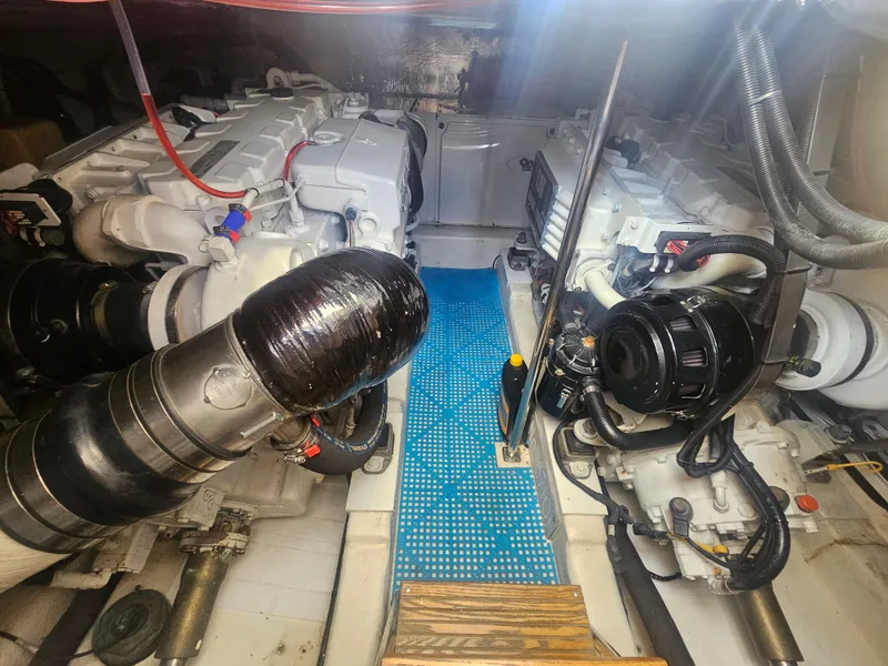 Slide: The Image of Engine room of 2005 Riviera 42 Flybridge yacht. - 39