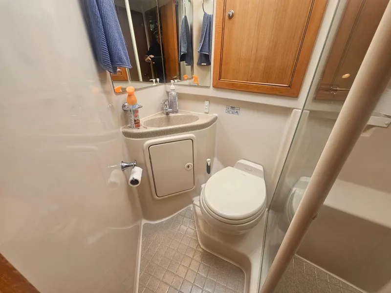Slide: The Image of Bathroom of 2005 Riviera 42 Flybridge with toilet and sink. - 41